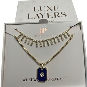 Bomb Party Luxe Layer 2026 “All Is Fair In Love And Sparkle” Gold/Blue Lapis Tag
